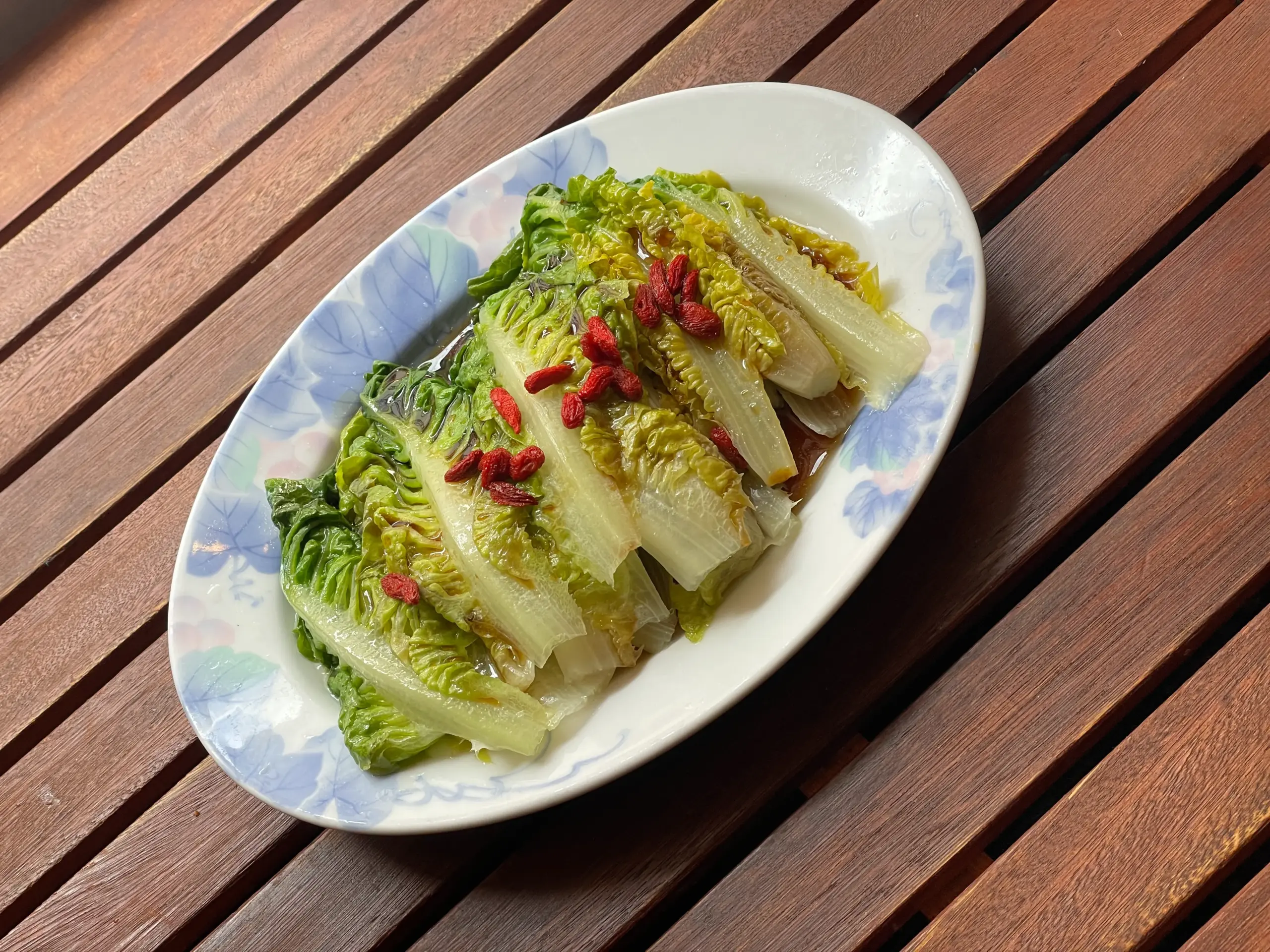 Soy sauce drizzled sparingly over the steamed romaine — Water element of TCM